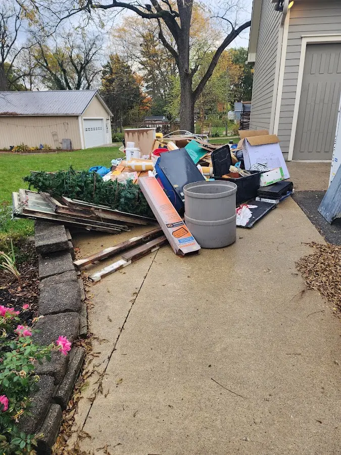 Dumpster being loaded with debris for Residential Dumpster Rental in Bethlehem